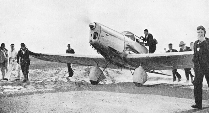KINGSFORD-SMITH TAXYING IN after his record-breaking flight from England to Australia in 1933