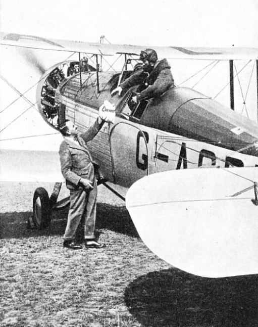 THE EVEREST MAIL being handed over to the pilot of the Westland Wallace machine