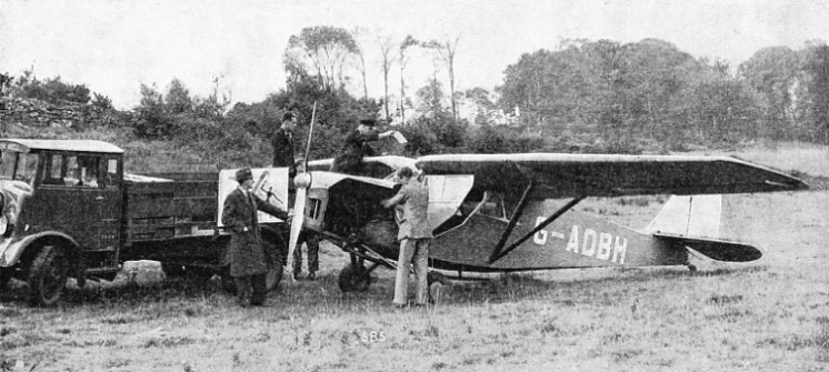 WHEN TWO PASSENGERS are to be carried in a chartered aeroplane the Leopard Moth is a suitable machine.