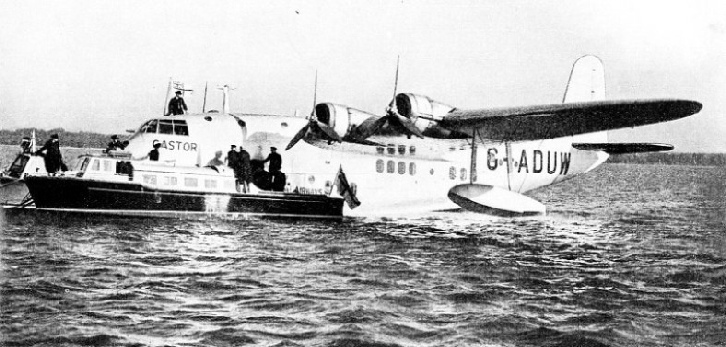 CASTOR, ONE OF THE EMPIRE FLYING BOATS, being loaded at Hythe