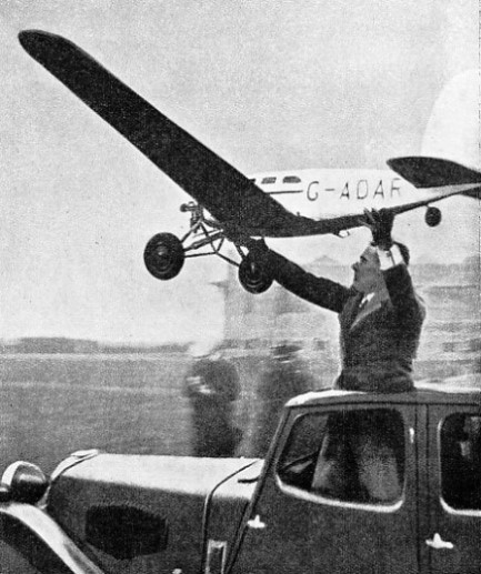A WING SPAN OF ABOUT TEN FEET makes this model a particularly fine example of petrol-driven model aircraft