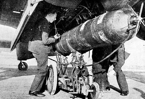 LOADING A BEAUFORT TORPEDO BOMBER