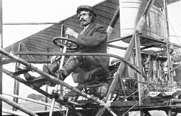 PILOT AND AIRCRAFT BUILDER. Samuel Franklin Cody, seated in one of his biplanes