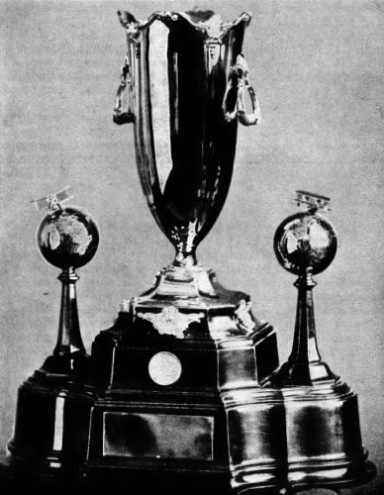 THIS MAGNIFICENT GOLD TROPHY was presented to the winners of the MacRobertson race from England to Australia in 1934